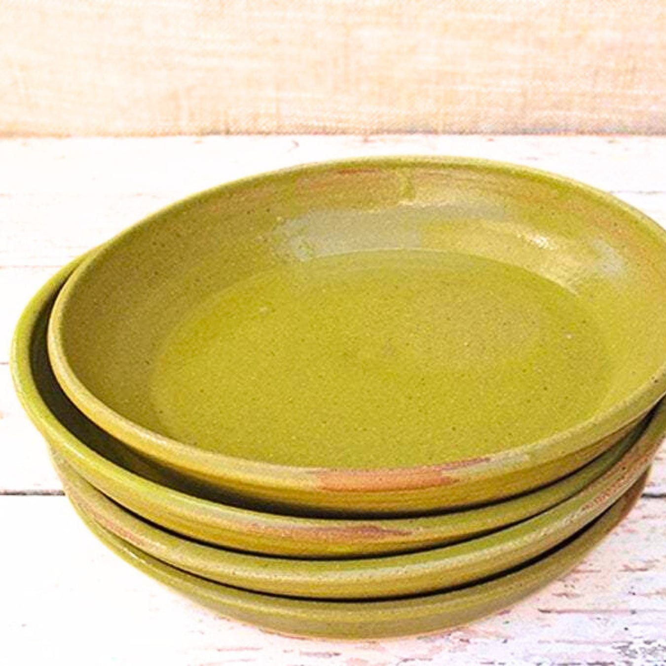 Green Ceramic Pasta Bowls from a Modern Rustic Dinner Set